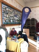 Rotarian David Whitfield-Bott selling raffle tickets for Hospice at Home West Cumbria
